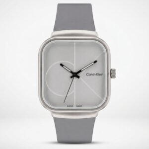 Calvin Klein square wristwatch with light gray dial, minimalist design, CK logo background, black hands with white accents, and gray strap. Swiss Made detail visible at bottom.